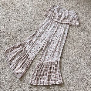 LIKE NEW // Japna strapless bell bottom floral jumpsuit